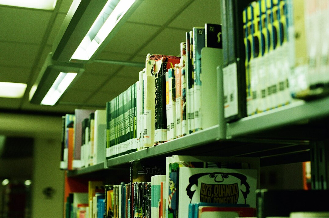 Archive shelves with research reports and binders