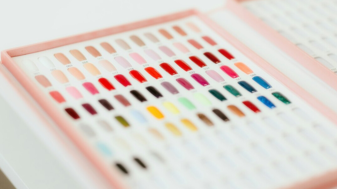 Printed statistical charts and data sheets on a desk